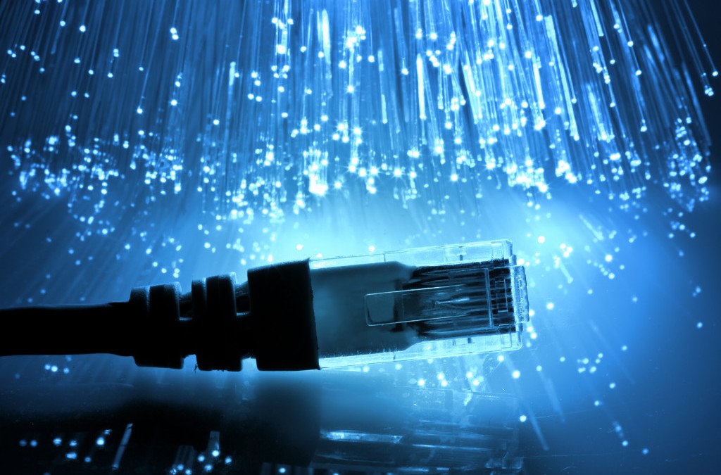 Telecom cost management|Phone cable plug with fiber optics surrounding it