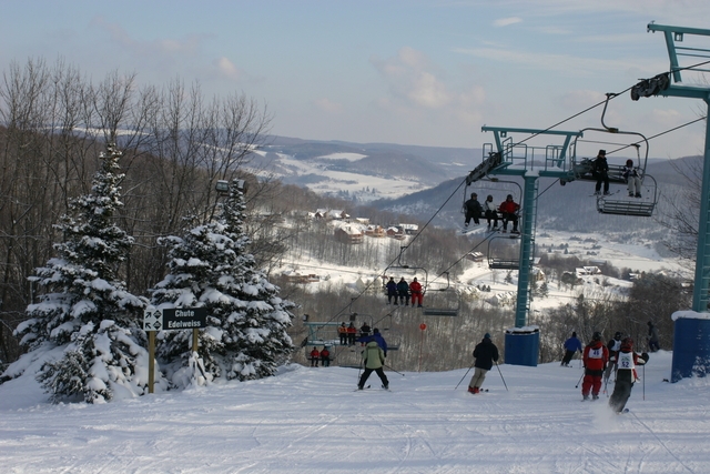 People skiing the slopes of Cattaraugus County NY