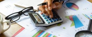 Free Utility Bill Analysis | desktop of spreadsheets, calculator | Cost Control Associates