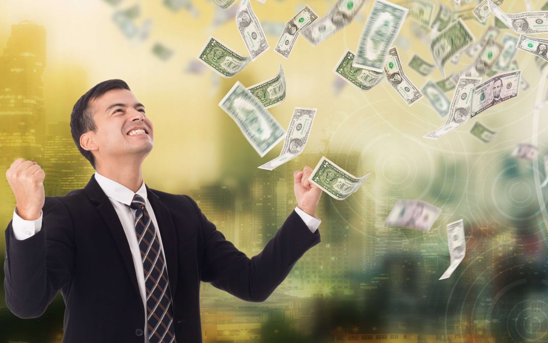 Save money on energy bills | business man happy about dollar bills swirling in the air